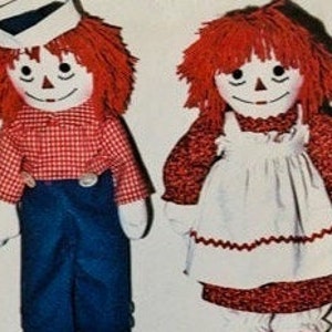 Mostly uncut 1977 McCall&#39;s 5713 traditional Raggedy Ann & Andy stuffed dolls in 3 sizes  (15&quot;, 20&quot;,  25&quot;) with blue transfer for embroidery.