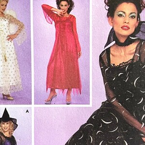 May include: Three women's costumes for Halloween. The first costume is a white dress with gold stars, the second is a red dress with a ruffled neckline, and the third is a black dress with a crescent moon pattern.