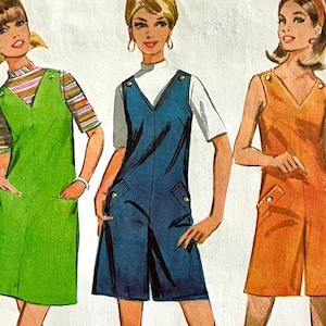 May include: Three women's vintage style jumpsuits. The jumpsuit on the left is green, the middle jumpsuit is blue, and the jumpsuit on the right is orange.