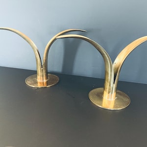 Set of 2 1950's 'Lily' solid brass candlesticks by Swedish sculptor Ivar Alenius Bjork for Ystad Metall, no damage, some tarnish.