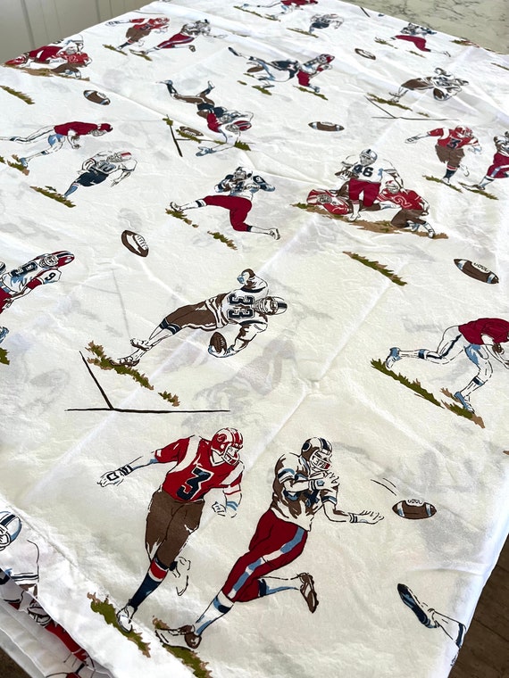 Pottery barn football sheets deals