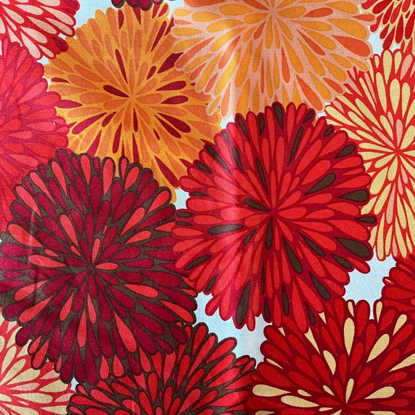 56" wide x 28" long cotton or cotton blend duck-like or light canvas-like fabric, great for upholstery, bright and burnt orange red florals.