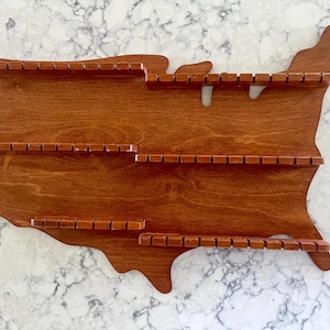 Vintage wooden spoon display rack in the shape of the United States, great condition, 60 slots for spoons; 23.5&quot; wide x 16&quot; tall x 1.5&quot; d.
