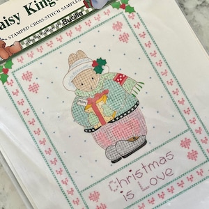 UNOPENED 1992 Bucilla 63444 kDaisy Kingdom stamped cross-stitch sampler &quot;Christmas is Love&quot;, bunny with gift for mom; no floss or needle.