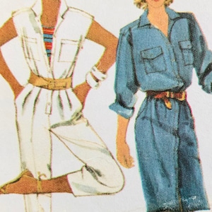May include: A white sleeveless jumpsuit with a tan belt and a blue denim shirt dress with a brown belt. The jumpsuit features a collared neckline and chest pockets, while the denim dress has long sleeves, a collar, and a button-down front design.
