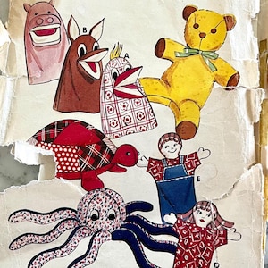 May include: A collection of vintage fabric hand puppets, including a yellow teddy bear, a red and black plaid turtle, and an octopus with blue tentacles. Other puppets include a pig, a donkey, a bird, a boy, and a girl.
