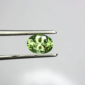 1.60 Carat Natural Afghanistan Peridot Faceted 6x8 mm Oval Eye Clean Loose Gemstone for Jewellery Making at Wholesale Price 100%Natural