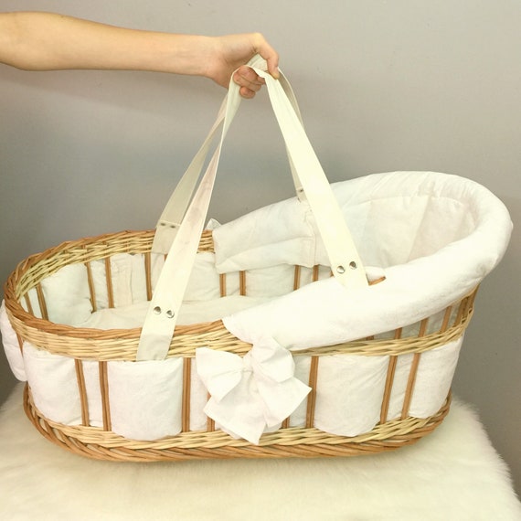 white wicker baby carriage