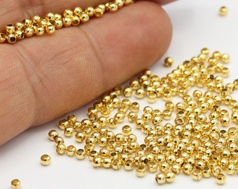 Cuentas espaciadoras chapadas en oro brillante de 2 mm y 24 k, cuentas de bolas - GLD38