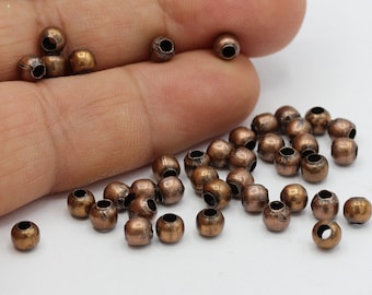 Perles d'espacement, billes de cuivre plaquées cuivre antique de 5 mm - TS462