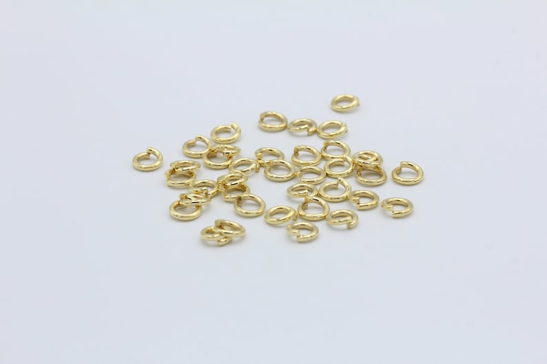 GLD15 1,2x6mm 24 k Shiny Gold Plated Jump Rings