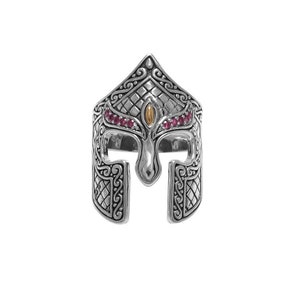 May include: A silver ring with a detailed design of a warrior's helmet. The helmet is adorned with pink gemstones and a gold accent.