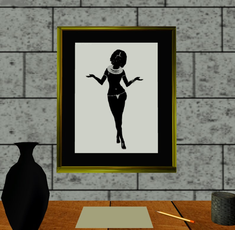 May include: A framed black and white silhouette of a woman wearing a necklace and a skirt, standing with her arms outstretched.