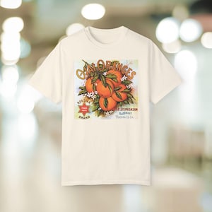Vintage T-shirt met citrus-oranjebloem: T-shirt met boho bloemenprint