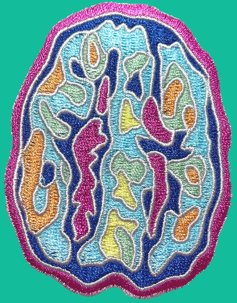 May include: A colorful embroidered patch with a brain-like design. The patch features a variety of colors, including blue, green, orange, pink, and yellow. The design is intricate and detailed, with a variety of shapes and curves.