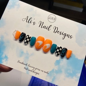 Mclaren inspired F1 Nails