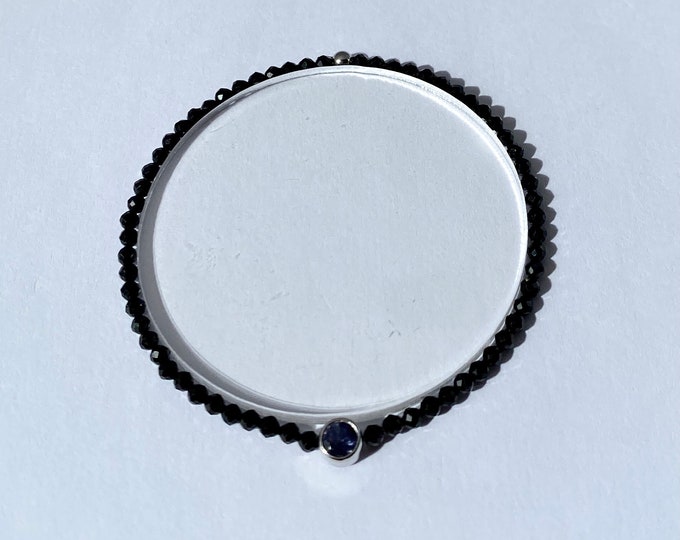 Black spinel, iolite and 9 kt white gold bracelet