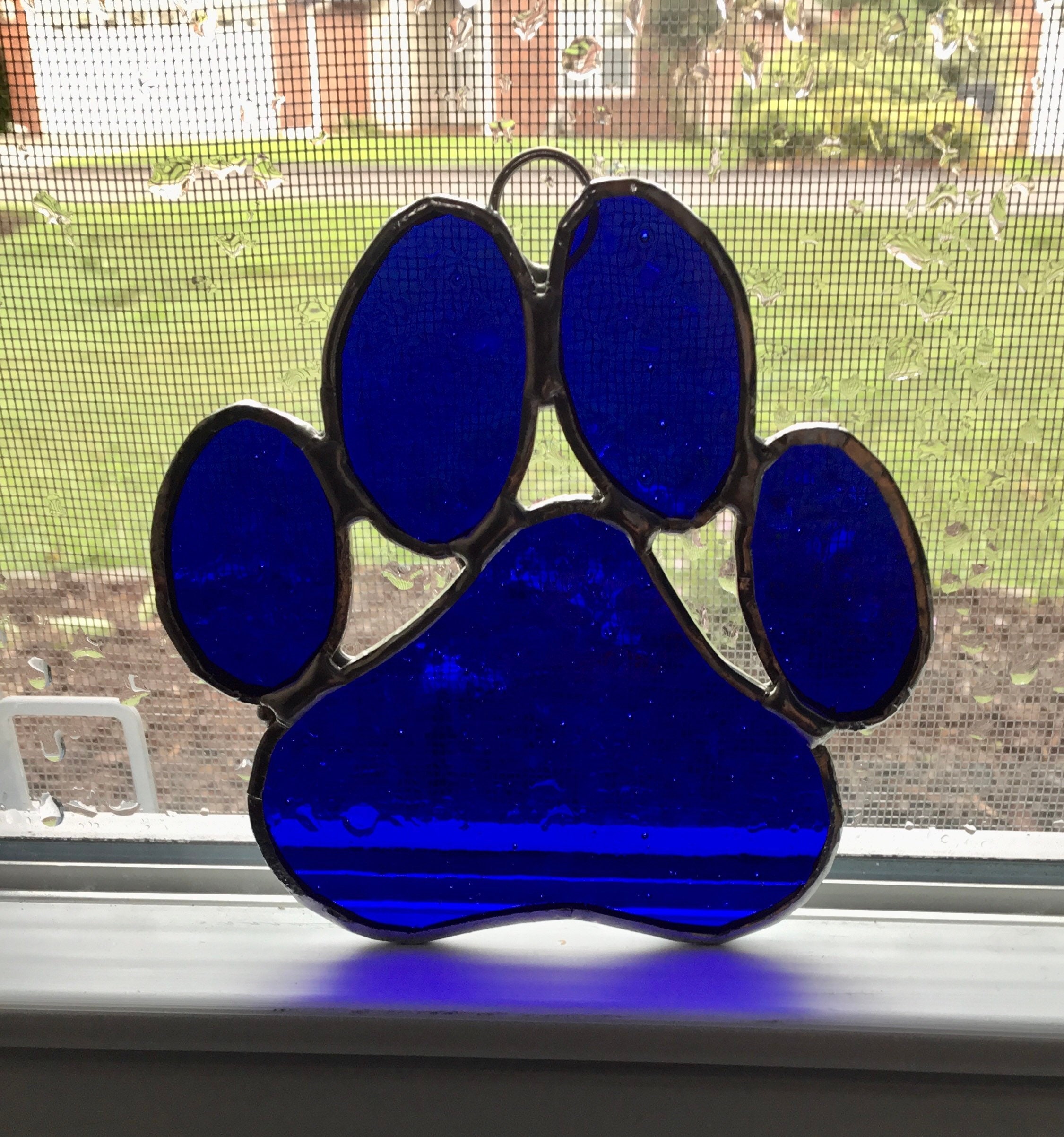 Stained glass paw print suncatcher | Etsy