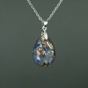 Sodalite Orgonite jewelry pendant made of 925 Sterling silver, handmade in a jewelry factory in Germany