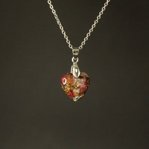 Orgonite heart pendant with thulite and mother of pearl for heart chakra and love