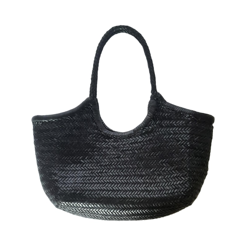 May include: Black woven tote bag with a braided handle. The bag has a rounded shape with a wide opening and a textured, basket-weave design. The handle is a single, continuous loop.
