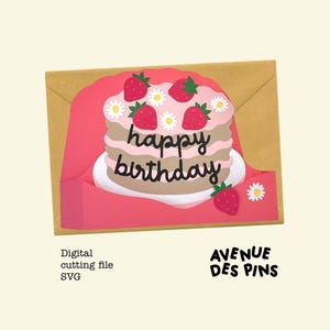 May include: A layered birthday cake card with strawberries and daisies. The words "happy birthday" are written on the cake. The card is inside a gold envelope. The words "Digital cutting file SVG" and "AVENUE DES PINS" are also visible.