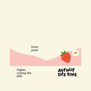 May include: A digital cutting file SVG with a pink wave design, a red strawberry, and a white daisy. The text "AVENUE DES PINS" is in black, and the words "front piece" are also visible.