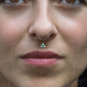 Ring in medusa piercing hot sale