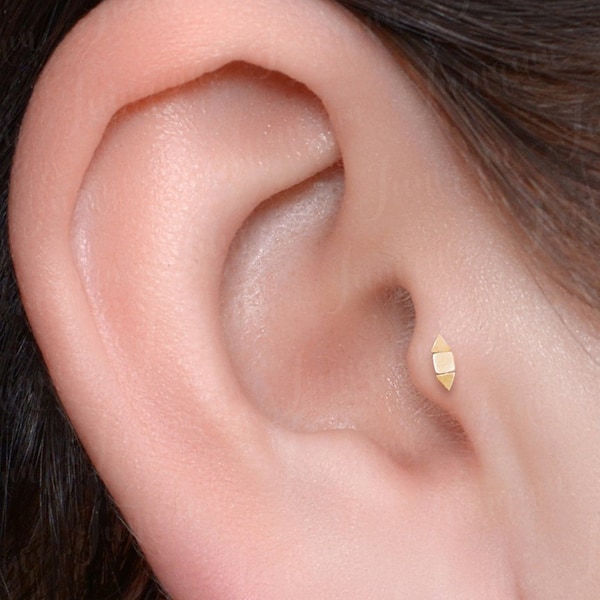 Tragus oorbel. Kraakbeen oorbel met platte achterkant, chirurgisch staal. Labret-hengst. Forward helix oorbel goud. Conch-ring. Tragus met interne schroefdraad.