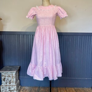 Vintage pink cotton prairie dress with knickers. Knotts Berry Farm of California marked size 12