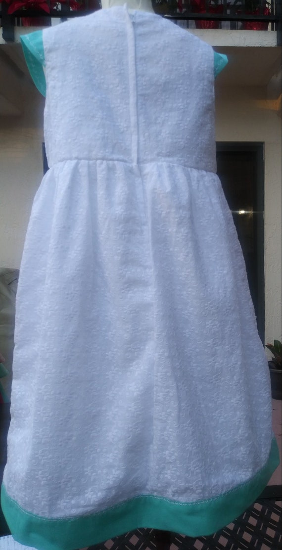 white cotton broderie anglaise dress