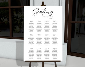 May include: A white seating chart with black text lists the names of guests for a wedding reception. The chart is titled "Seating" with the couple's names "Katelyn & Thomas" and the date "6.18.23".