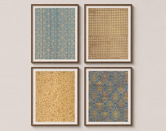 May include: A set of four rectangular wall art prints in dark brown frames. The top left print features a blue and gold floral pattern. The top right print shows a gold houndstooth design. The bottom left print displays a gold botanical motif. The bottom right print has a blue and gold leaf pattern.