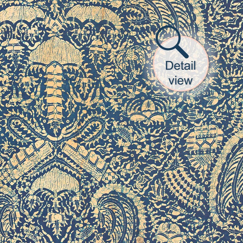 detail view of Indonesian batik textile wall art print showing abstract crayfish motif in indigo blue and cream tones