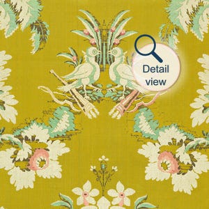 detail view of French antique floral textile wall art print showing two mirrored birds and flowers in sage green and pink on a chartreuse background