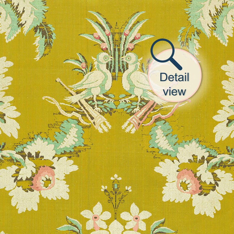 detail view of French antique floral textile wall art print showing two mirrored birds and flowers in sage green and pink on a chartreuse background