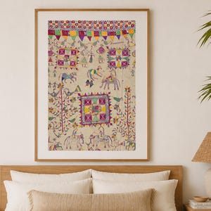 May include: A framed, colorful artwork with a traditional Indian design. The artwork features figures, animals, and geometric patterns in shades of red, yellow, green, and purple. The artwork is displayed in a wooden frame.