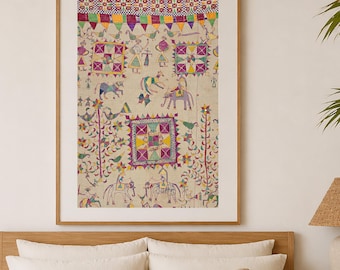 May include: A framed, colorful artwork with a traditional Indian design. The artwork features figures, animals, and geometric patterns in shades of red, yellow, green, and purple. The artwork is displayed in a wooden frame.