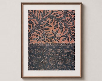 May include: A framed wall art print featuring a split design. The top section displays a dark charcoal leaf pattern on a terracotta background. The bottom section shows a dark charcoal floral and bird motif separated by a decorative lace border.