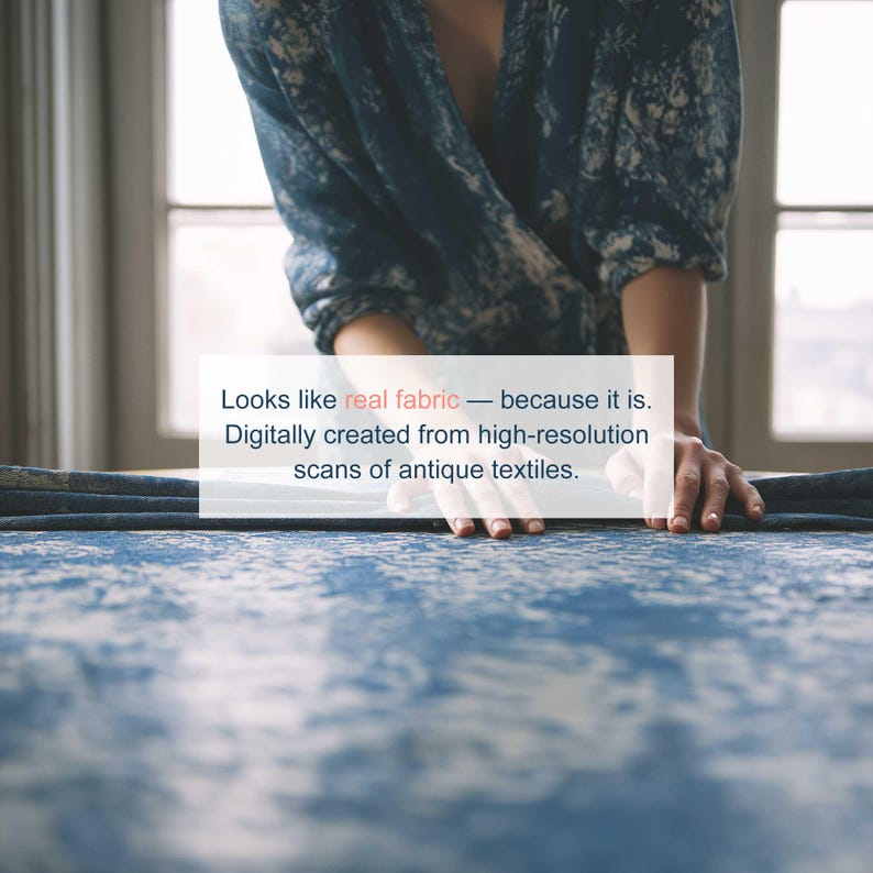 May include: A close-up of a blue and white patterned fabric. The fabric is being handled by a person. The text on the image reads: "Looks like real fabric - because it is. Digitally created from high-resolution scans of antique textiles."