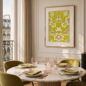 Chartreuse French brocade textile print in gold frame with cream mat, styled in a Paris apartment dining room with rose glassware and chartreuse table setting