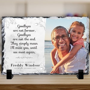 a picture frame with a picture of a father and daughter