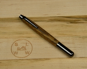 Bolígrafo Rollester en gunmetal con un cañón de madera de cebra abigarrado y rollerball Schneider