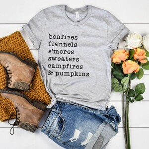 bonfires flannels s'mores sweaters campfires pumpkins image 0