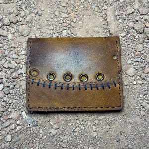 Cartera con guante de béisbol de cuero recuperado