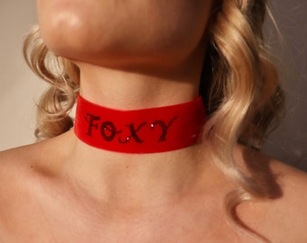 Burlesque red velvet choker with ‘Foxy’ word in black diamanté and black organza ribbon back