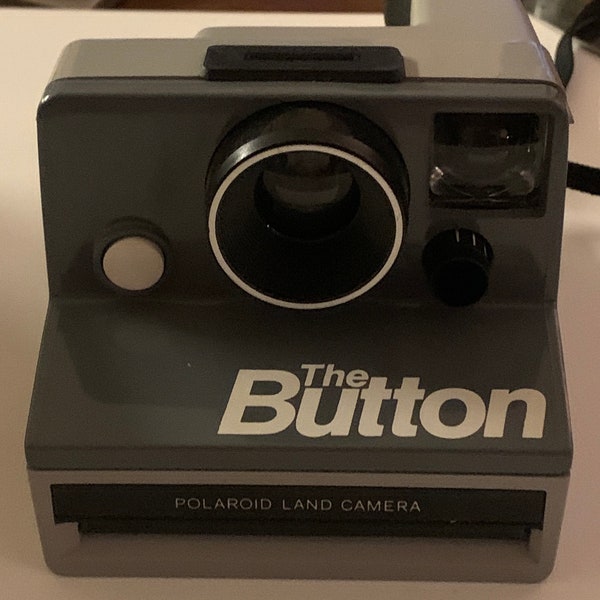 Polaroid Button land camera in box. Camera in great shape. Great for collector or camera lover. Prop or buy some film and give it a go!