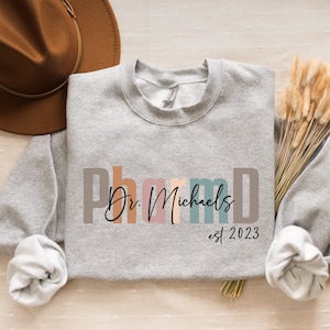 Personalized PharmD Sweatshirt, Pharmacy Graduation Gift, Doctor of Pharmacy Shirt, Custom Pharmacist Graduate Sweater, New Pharmacist Gifts
