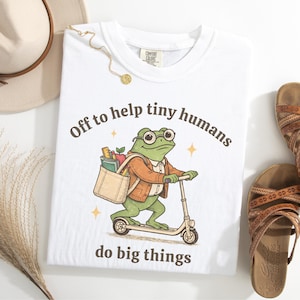 May include: A rustic wooden sign with the text "Welcome to our home" in white lettering. The sign features a distressed finish and a simple, inviting design, perfect for a front porch or entryway.