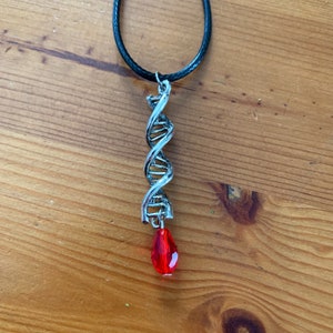Silver Double Helix Necklace with Red Crystal Teardrop Pendant